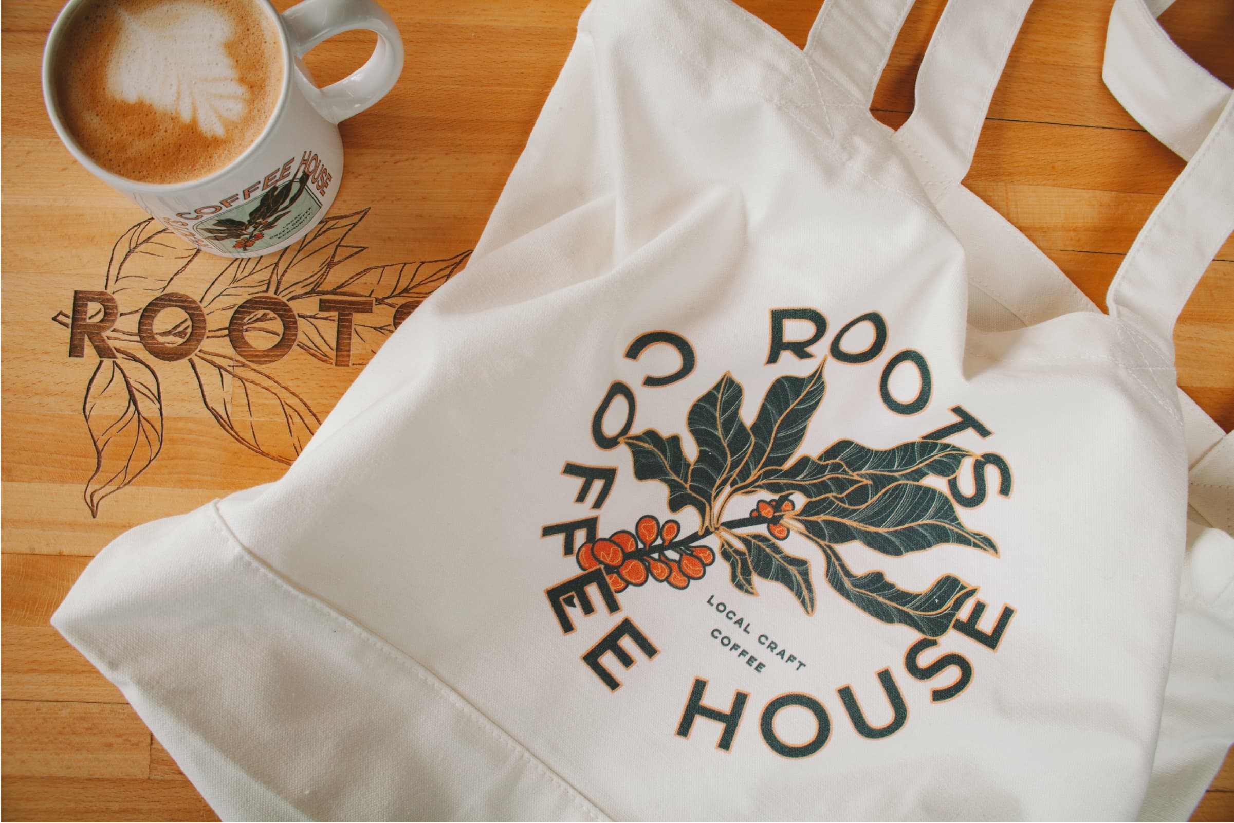 roots coffee house branding design photo of tote bag and coffee mug