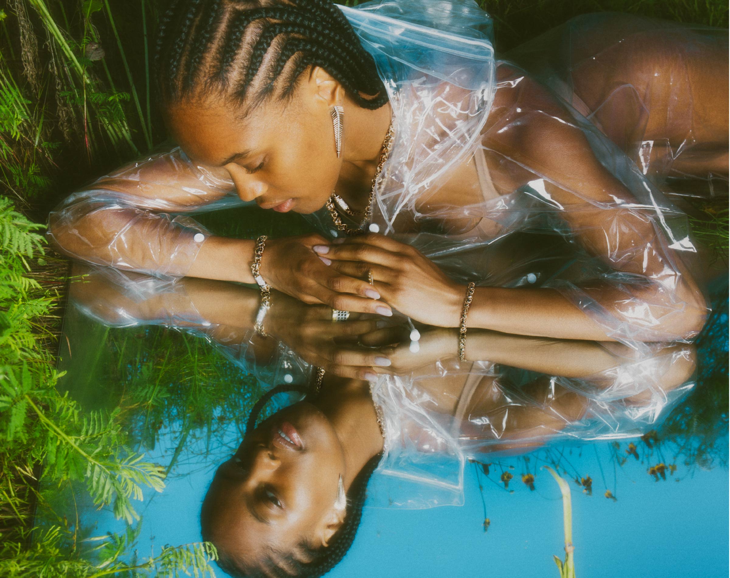 jo latham daydream editorial photography of model in grass with mirror and luxury jewelry for summer campaign