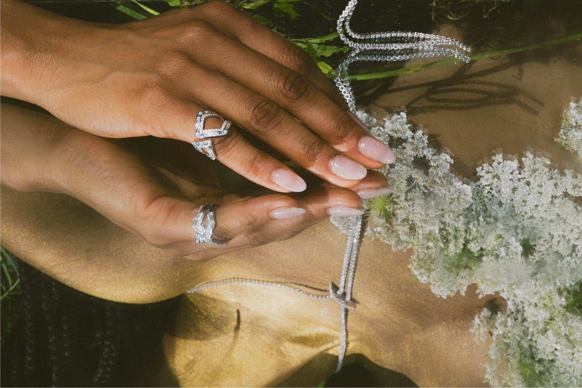 jo latham daydream editorial photography of model in grass with mirror and luxury jewelry for summer campaign