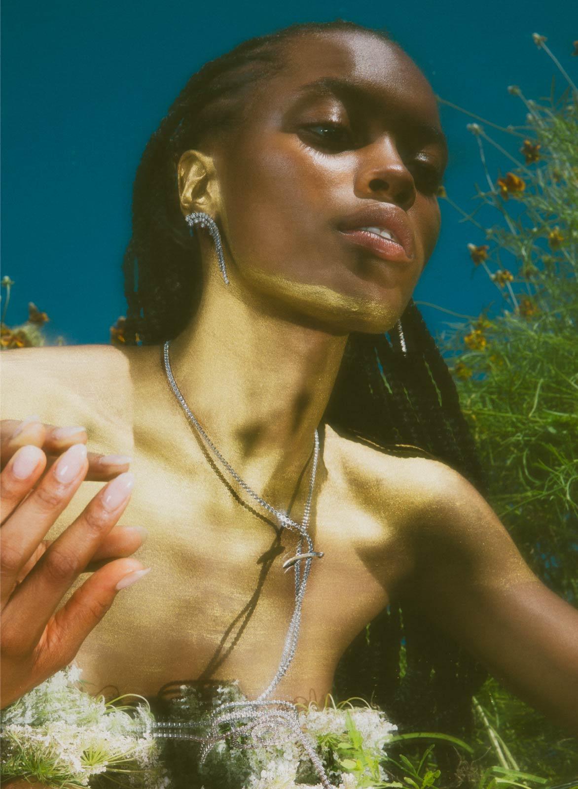 jo latham daydream editorial photography of model in grass with mirror and luxury jewelry for summer campaign