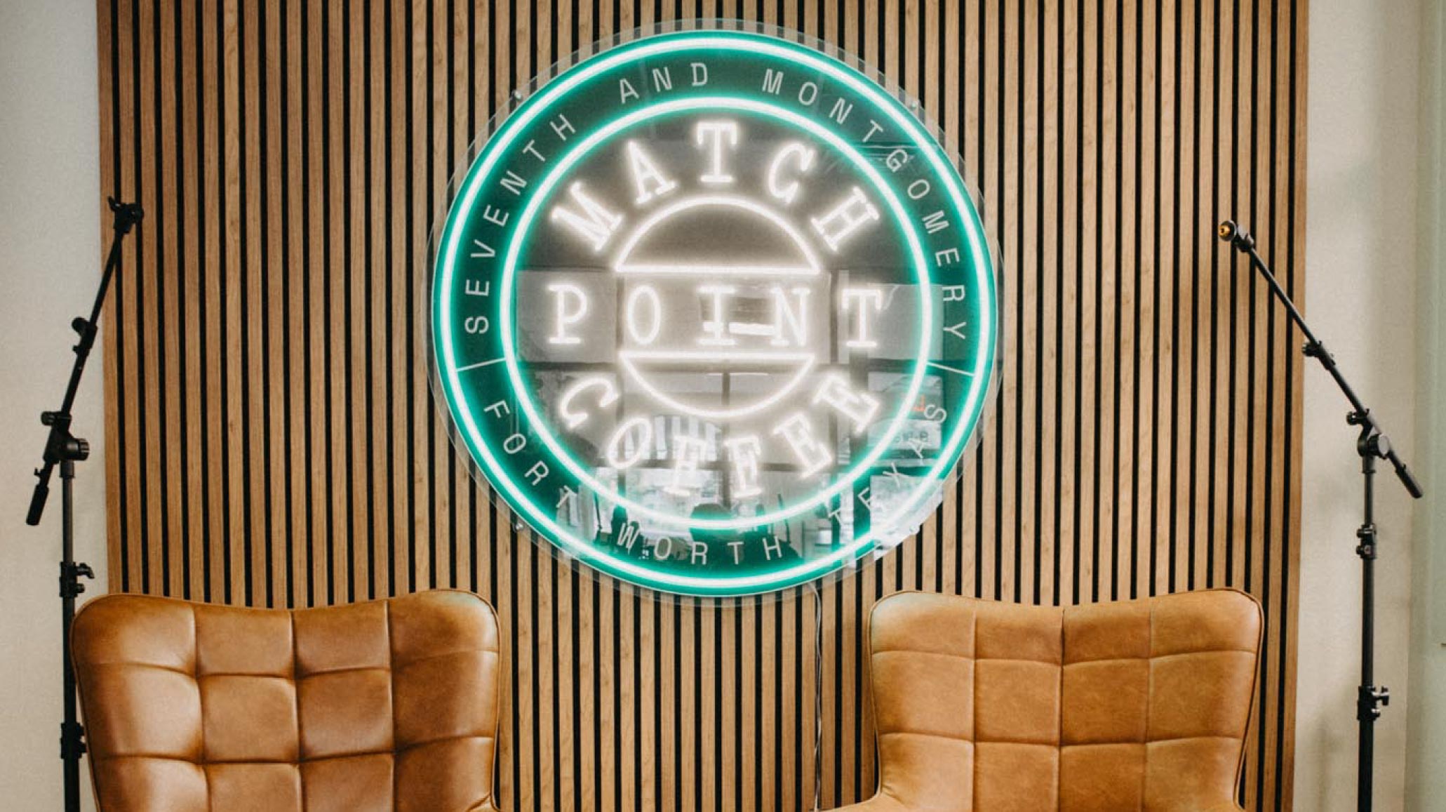 neon sign that says match point coffee